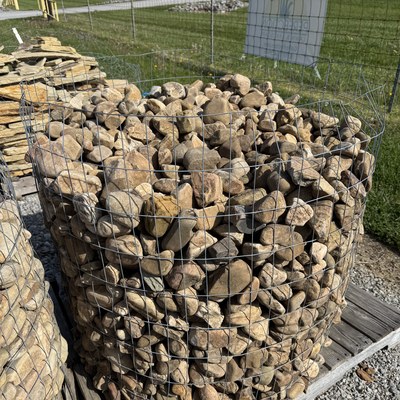 Cobbles in wire basket